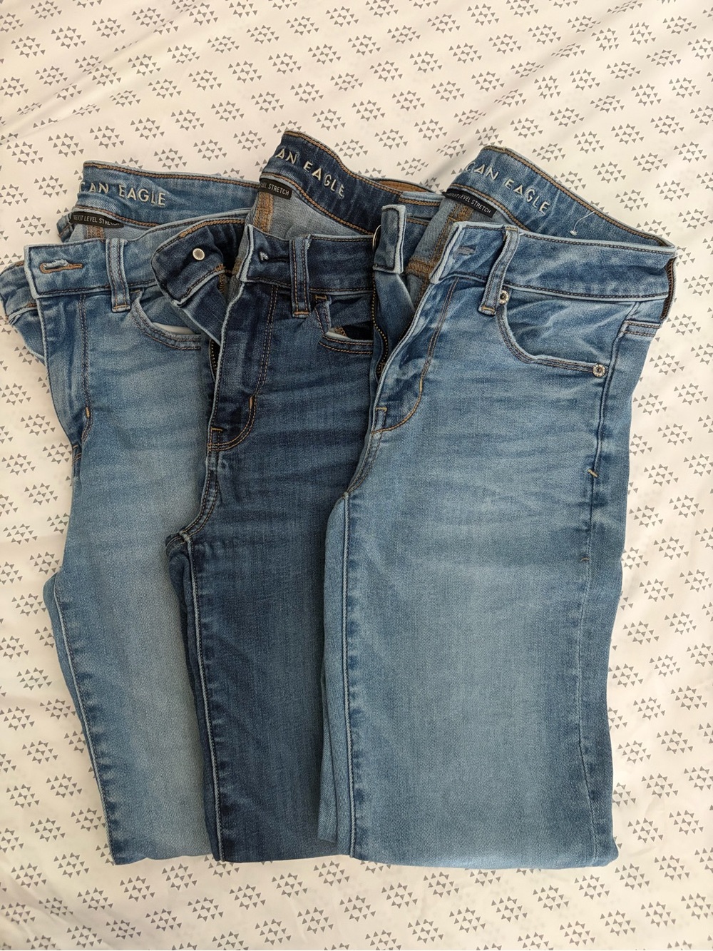 3 pair American Eagle Outfitters Women’s next level stretch size 4 Jeans